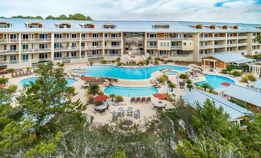This luxurious 3-bedroom condo along the sought-after West 30A is truly a gem. Nestled within a serene resort setting on Little Redfish Lake, you'll enjoy the perfect blend of tranquility and convenience, with the stunning South Walton Beaches just moments away.  As a prime end unit, this secluded retreat with two private balconies benefits from a peaceful location and an abundance of natural light, creating a serene environment for ultimate relaxation. The unit boasts three generously sized bedroom suites each offering privacy and comfort. Freshly painted throughout, including walls, trim, and cabinets, the space feels modern and fresh. A cozy corner fireplace adds a touch of elegance to the open living and dining area.For convenience, the condo comes with front door parking. bonus golf cart parking for exploring all the nearby restaurants, bars and shops in the area. Whether you're enjoying the privacy of the condo or venturing out to nearby attractions, this is the ultimate spot for a luxury lifestyle. Sanctuary at Redfish is a gated community with attached covered garage parking for cars and golf carts, professional fitness center with spa services, 4 pools including heated pool and adult only pool, 2 hot tubs and grilling hang out. The only community along 30A with direct access to the gulf from the included water taxi or store your paddle board or kayak to enjoy the lake activities 