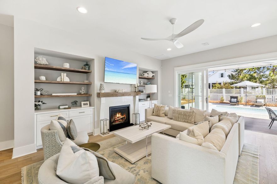 Discover refined coastal living in this Romair Suffolk at Watersound Origins. A dramatic foyer welcomes you into a sun-drenched living space with 20-foot ceilings, creating an immediate sense of scale and light. The open-concept floorplan flows from a chef's kitchen--featuring Bosch stainless-steel appliances, a striking 10-foot island with custom pendant lighting, and thoughtful finishes--to the dining area and great room, perfect for daily life and entertaining.The great room is anchored by a fireplace flanked by custom built-in bookcases and large sliding glass doors that open to a covered porch, seamlessly extending the living space outdoors. The adjacent dining area includes built-in bench seating with under-bench storage for smart, stylish functionality. Retreat to the luxurious master suite with French doors that open directly to the pool. The large master bathroom offers high-end finishes and a spacious shower equipped with a custom rain shower head. Custom California closets throughout the home provide organized, upscale storage.



Additional highlights:

- Quiet street with front yard facing neighborhood greenspace

- 400 sq. ft. unfinished bonus space ready to be customized to buyer preferences (prime opportunity to increase value)

- Move-in ready luxury with room to grow


A superb combination of elegant design, built-ins, and customization potential -- ideal for buyers seeking a coastal lifestyle with thoughtful, high-end finishes.