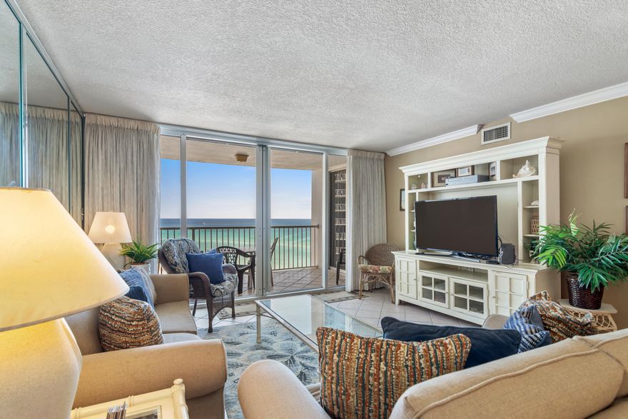 Come enjoy the beautiful emerald green waters and beautiful white beaches in a two bedroom/two bath unit in Tower 2. Unit has been remodeled with the new open kitchen design.  This spacious 1430 sq ft unit has two full bedrooms and bathrooms.  Great vacation rental or second home with beautiful views of the beach from every room.  Shoreline Towers is a gated community with patrol here 24/7.  400'+ of private beaches.  Amenities include seasonally heated pool, tennis/pickleball courts, shuffle board, fitness center, picnic grilling area and Owner's Clubhouse with full kitchen.  Beaches are handicap accessible .   No pets allowed on property.