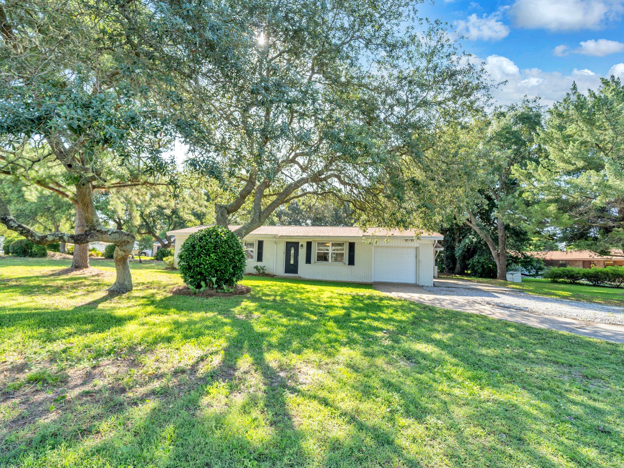 Spacious 4-bedroom, 3-bathroom home located in the Heart of Destin, that is Move in ready and was completely renovated in 2019. Do you need a separate Suite? This home has one, complete with Master Bedroom, Master Bathroom, and Living Room! Need a place to Park your Boat or RV? No worries, there is plenty of room! Updates done to this home include: kitchen with Shaker Style Cabinets, master bathroom with shower, flat ceilings, light fixtures, ceiling fans, inside laundry, remodeled two bathrooms, quartz, stainless steel appliances, high-end flooring, interior and exterior paint, and much more! This home sits on a large corner lot, which adds some great curb appeal. Just a short Walk to the harbor or some of the finest bayfront parks in the area, schedule your exclusive showing today.