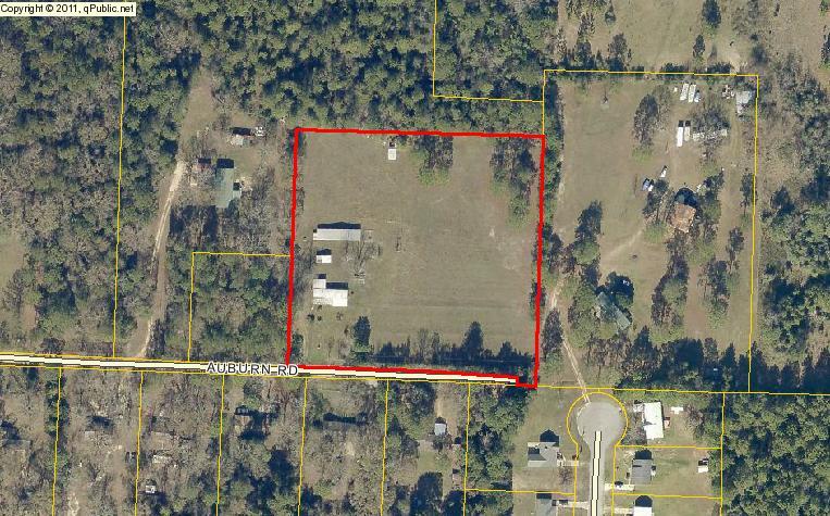 Value is in the acreage! Older manufactured home with block addition on nearly 4 acres close to town but with a country feel. Bring your animals and your house plans or just use the existing home as a getaway. Open barn and workshop on the property. Good pasture/tillable land. Cash or third party financing only. Make your appointment today!