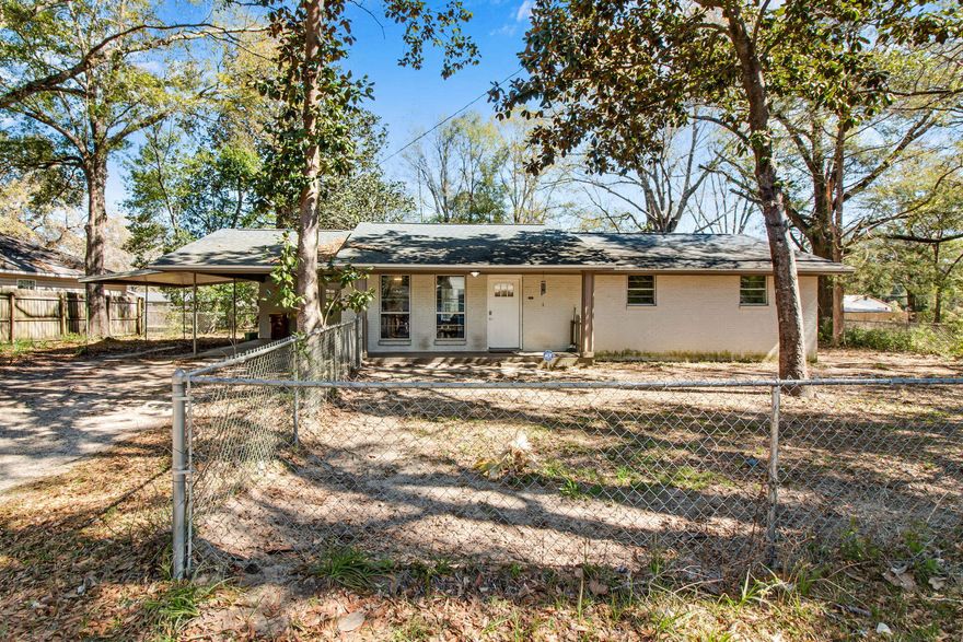 Charming updated ranch-style home in Southeast Crestview, conveniently located near shopping and Hwy 85. This well-maintained home features tile flooring throughout, a spacious kitchen with an island, and stainless steel appliances. The cozy living room includes a fireplace, perfect for relaxing. Situated on a generous lot, this home offers plenty of outdoor space. Ideal for those seeking comfort and convenience in a prime location. Don't miss the opportunity to make this home yours!
