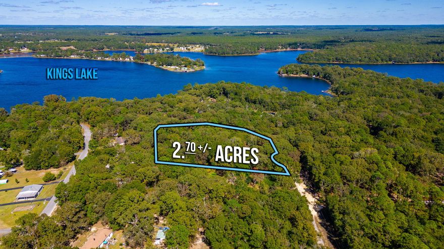 Priced to sell, this 2.7-acre property is your ticket to a simpler, natural lifestyle. The land is graced with mature oak trees that provide not only shade but a sense of timelessness. Some of the land has been cleared, so it's a blend of open space and nature's beauty. It is only nearly 5 miles from the city limits and nestled near Kings Lake. It is the perfect blend of nature and convenience. Picture your dream home amidst this serene setting which is a breeze to access by county-maintained road. The property once had a home on it so there is already easy access to utilities. Whether you plan to have a site-built home or have a manufactured home set up, this property could be the perfect fit. Don't miss this chance. Schedule a visit and let this property inspire your imagination! Schedule a visit and let this property inspire your imagination!