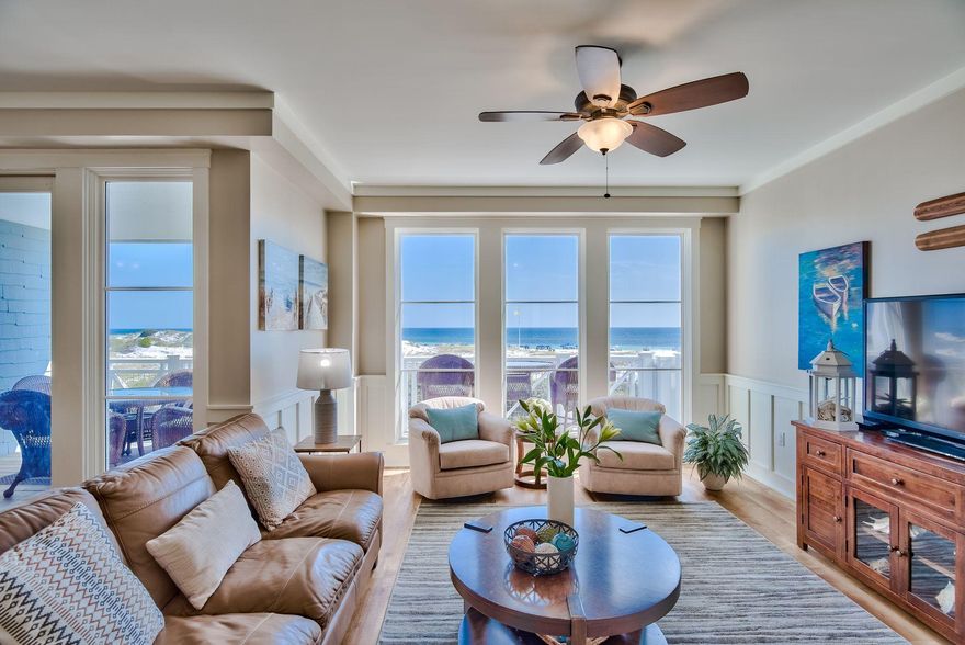 This two-story gulf-front unit offers tranquil beach living with its many upgrades and amenities. Tucked in the gated community of WaterSound Beach, this coastal unit features over 2,000 square feet of living space, and its main living areas are located on the second floor, which is easily accessed by a private elevator. Open and inviting living areas feature new flooring, calming colors, and inspiring views of the Gulf of Mexico. A gourmet kitchen includes recently upgraded stainless steel appliances while a spacious dining area allows for easily entertaining family and friends. The attached garage provides additional storage or room for parking a car and beach toys.