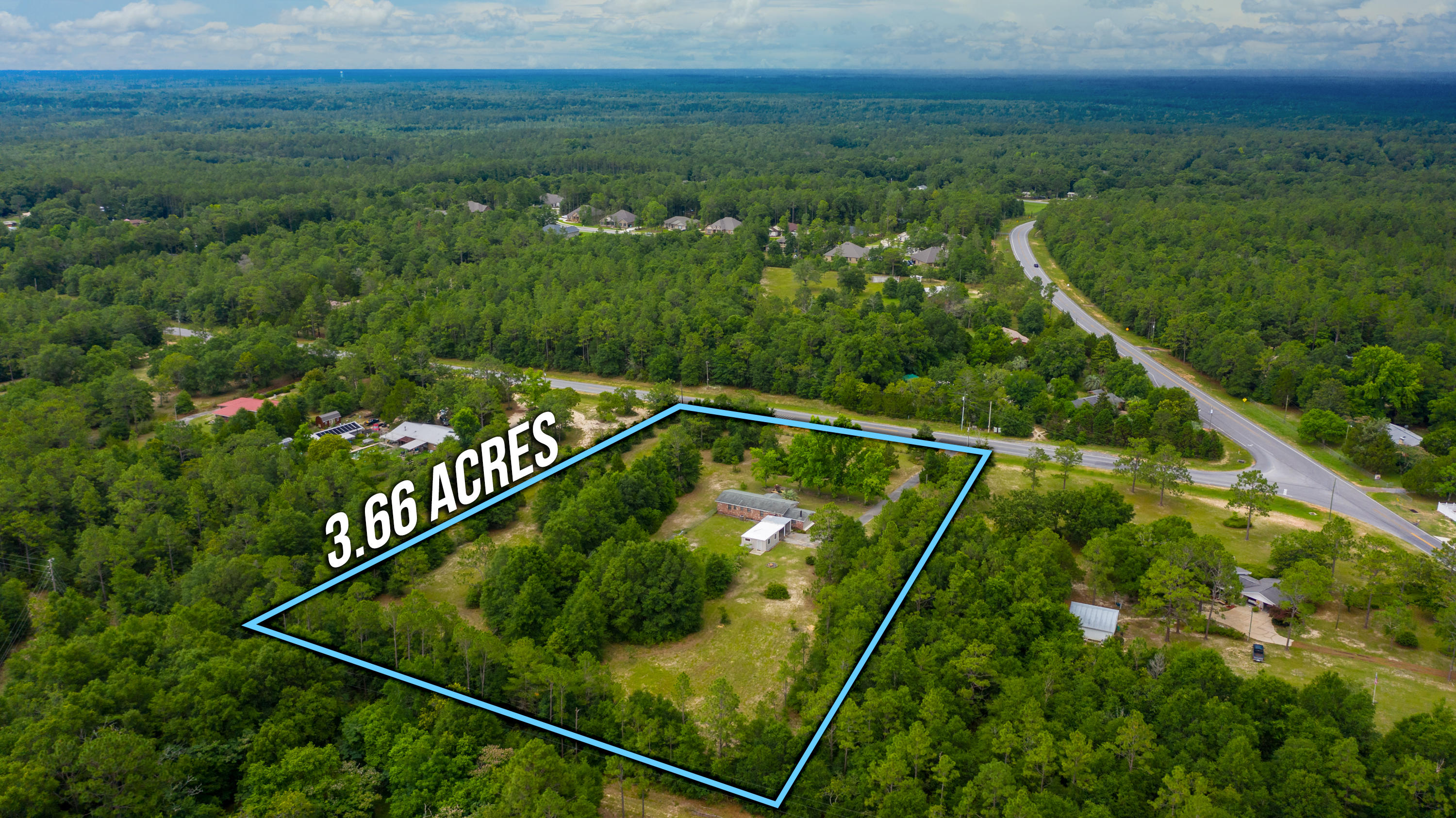 Back on Market, Not fault of the Seller !! Your little piece of paradise so close to town. This 1568 Sq. Ft, 4 bedroom 2 bath home sits on 3.66 acres and includes an additional 275 sq. ft 'Man Cave' that could be used for just about anything, The sellers updated this home with laminate & tile flooring / complete bathroom remodels / Kitchen upgrades / Lighting / Roof 2012 / Water Heater 2012. The 4th Bedroom could double as a Den which features a Fire Place & Large Closet. A large section of the backyard is done in chain link fence for your pets/kids. Inside the fence is a cement slab workshop with access to power and water hook up. Come experience all this house and property have to offer !