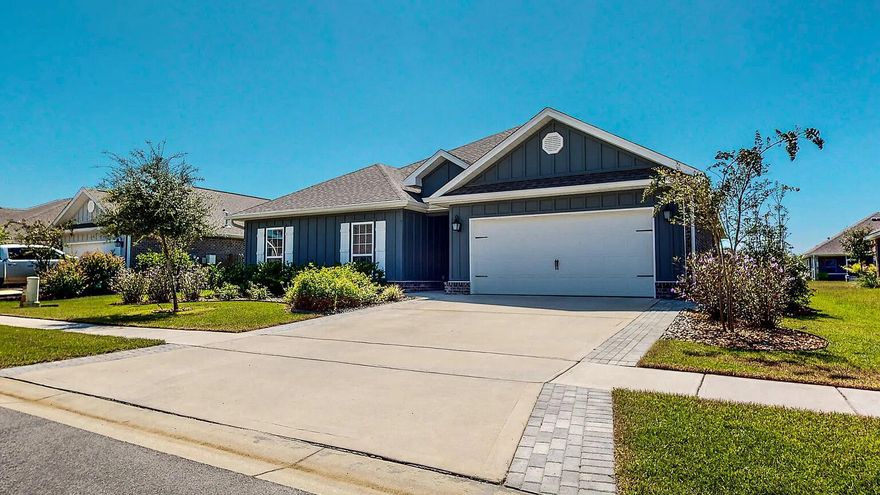 Spacious 4 Bedroom, 2 1/2 Bath home with a HUGE living area. With Granite countertops in kitchen & baths, Stainless Steel Microwave, Stove, Dishwasher, Brushed Nickel Plumbing fixtures, 5ft Tile Shower in Master Bath, Crown Molding in entry, family room & master bedroom, hard surface flooring in all common areas of the home, carpet only in bedrooms, Gas Stub outs, Gas Hot Water Heater, Rear Gutters, Full Irrigation, Fully Privacy Fenced Backyard & much more.... This home is loaded with features! You wont have to spend extra $$ on upgrades. Assumable VA Loan at 3.625%