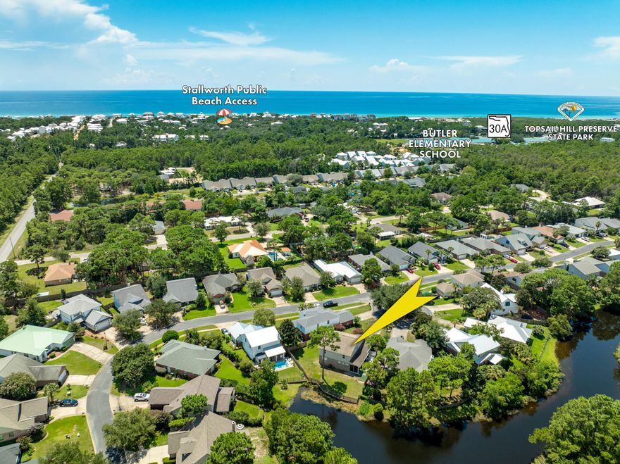 NEW LISTING! 12 Corte Lago -- a charming lakefront retreat in the highly desirable (no short-term rentals) Escada community of Santa Rosa Beach, perfectly situated in the heart of South Walton of Scenic 30A on the Emerald Coast of Northwest Florida. This two-story residence offers 4 bedrooms, 2.5 baths, 2,382 sq. ft. of living space, and a generous 2-car garage with extended driveway, all tucked away on a peaceful cul-de-sac near the community entrance and coveted amenities. SELLER IS OFFERING A $10K FLOORING CREDIT UPON OFFER ACCEPTANCE.Inside, you'll love the spacious open living, kitchen, and dining areas, along with the first-floor master suite featuring serene lake views, double vanities, a garden tub, and an updated tile shower. Upstairs, three additional bedrooms, a full bath, and a versatile bonus loft provide plenty of room for family, guests, or a home office. Recent updates include new kitchen countertops, stainless steel appliances, freshly painted bedrooms and cabinets, a cozy fireplace, outdoor shower, new HVAC, and a new hot water heater.
Step outside to a screened-in porch with swing, an extended deck, and a fenced backyard where you can relax in privacy while overlooking the lake.
Residents of Escada enjoy resort-style amenities including a pool, tennis and basketball courts, and scenic bike/walking trails that lead directly to Butler Elementary, the Scenic 30A path, and Topsail Hill Preserve State Park. Even betteryou're only a 6-minute bike ride or 15-minute walk to the sugar-white sands of Stallworth Beach, with South Walton's best restaurants, shopping, and attractions just minutes away.
Don't miss your chance to own this rare lakefront gem in one of South Walton's most sought-after neighborhoods. September 2015 "As Built" Survey is located under the Documents Tab. Call to coordinate your showing today. 
