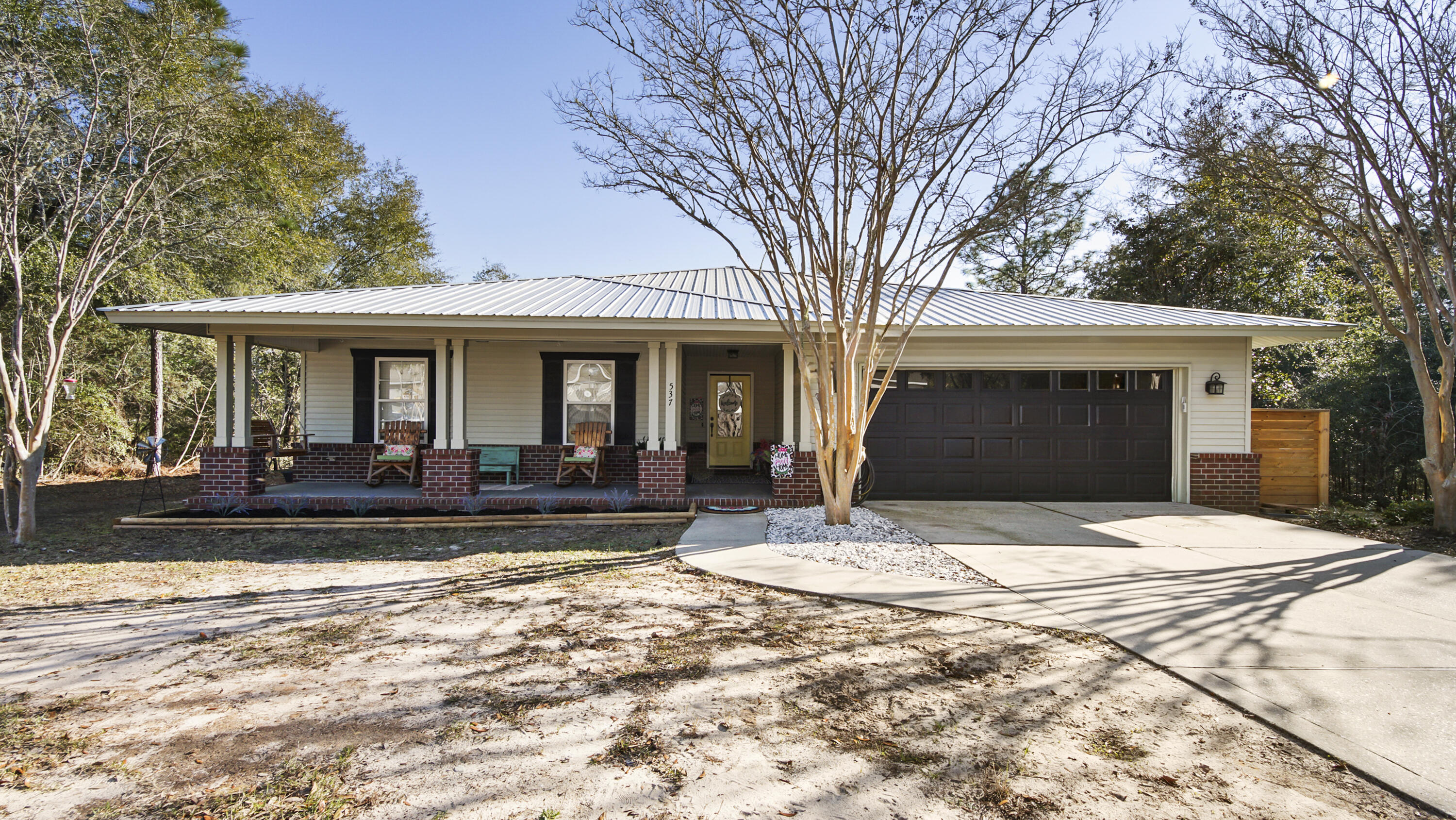 Discover comfortable living in this charming 4-bedroom, 2-bathroom home nestled in the heart of DeFuniak Springs. Boasting 1,719 square feet of well-appointed space, this property features metal roof, new HVAC system and brand-new appliances, setting the stage for a move-in-ready experience. The primary bedroom offers a serene retreat after a bustling day. With open concept, this home has plenty of room for entertaining and expands to large screened in back porch. The 4th bedroom could be used as an office or playroom. The possibilities are endless and you will see from the moment you step in that the home has been well maintained. Make an appointment today and come see all the unique touches to this property and discover what makes this the perfect place to call home.