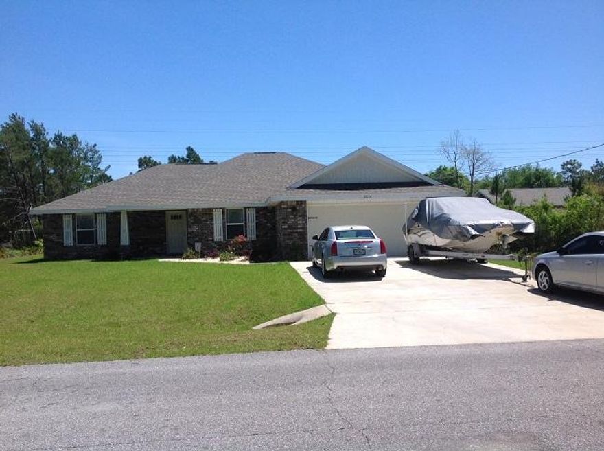 Immaculate. Immaculate. True Pride in Ownership. Custom built all brick Robert Walk Up Construction Home with many upgrades. For starters come see the gorgeous kitchen with all stainless steel appliances including dishwasher, stove, and microwave, double door pantry, custom designed Java Mocha colored cabinets with soft close drawers and granite countertops. Now take a stroll around and you will notice the attention to every detail. Like the Spanish lace cathedral ceilings, wide 6'' colonial baseboards, bullnose corners and rich dark wood floors in the living and kitchen areas. As well as gorgeous acid washed concrete floors in the bedroom this home is truly magnificent top to bottom.