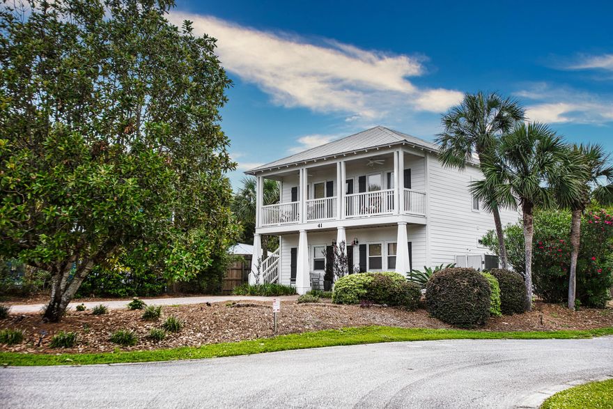 The quaint neighborhood of Tranquil Shores is ideally located in Seacrest Beach. Only about 200 steps to the beach access, a mile to Alys Beach and less than 2 miles to Rosemary! All the shopping, dining, and entertainment is a quick bike or golf cart ride away. This beautiful coastal home has LVP flooring both upstairs and down and tile in the bathrooms. The large living/kitchen area are on the 2nd floor. 2 master bedrooms, one up, one down. Upstairs master bath has 2 separate vanities, large walk-in shower, huge walk-in closet and owners closet.  The first floor has another master bedroom, and 2 additional bedrooms, one with built in bunks. Laundry room is on the first floor which is convenient after a day at the beach. The large covered side patio is perfect for entertaining.