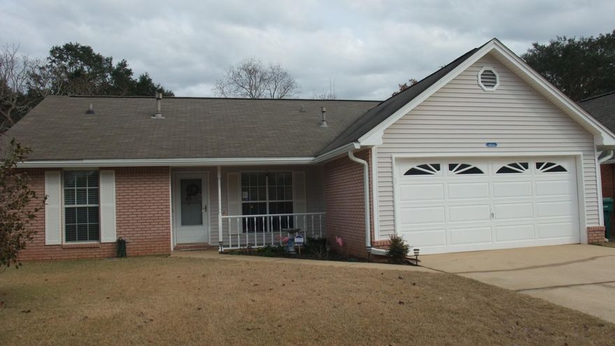Gorgeous updated home in a great location. This home features a living room with fireplace, screened Florida room, 3 bedrooms, 2 baths, and a 2 car garage. Home has lots of newer updates which include new baseboards, light fixtures, ceiling fans, carpet, tile, master bath cabinets, sinks, faucets, quartz counter tops in kitchen and master bath, gutters and interior paint. All lights upgraded to LED. Whirlpool stainless steel appliances include dishwasher, microwave, refrigerator, and smooth top stove. Also included is the Samsung washer and dryer set.