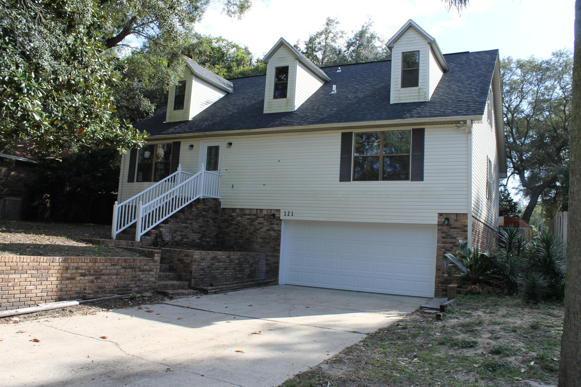 You have got to see this home. Brand new roof, HVAC, paint and flooring installed. This is a tri-level home with the master and an additional bedroom on main level and an additional bedroom/game room and bath on upper level and on lower level, a fourth bedroom and half bath along with an additional living area. The garage has a built in workshop in the front of the garage with more than adequate parking for 2 vehicles. There is additional storage on the lower level off of the lower level living room. This home is a must see for a family, it is with-in walking distance to Niceville High School and Ruckle Middle. Make your appointment today to see this home before it is gone.