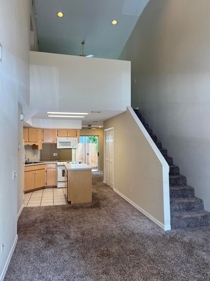 Great location, very convenient to both bases, shopping and dining. Townhouse located in Wilson Square neighborhood off of Hurlburt Rd. Downstairs you have a VERY HIGH vaulted ceiling in the living room, master bedroom with his and hers closets and a private vanity, an attached full bath, great kitchen with island, dining room, washer and dryer, and a garage with workbench. Upstairs you'll find a fantastic loft, two good sized bedrooms, and another full bath. The private backyard is fully fenced. NEW INTERIOR PAINT, NEW GARAGE DOOR OPENER, NEW ROOF, all of the rooms have ceiling fans and most have recessed can lighting. All of the upstairs windows have hurricane shutters. Call today to see this move in ready property!