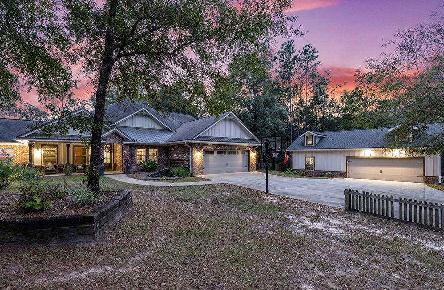 Tropical Oasis in the Country!  The perfect family compound.  Custom built home with a massive resort style pool fit for the 4 Seasons and a 1000+- sqft detached heated/cooled garage that would make for the perfect man cave or car collector! This 5 bed/3.5 bath main home, 1 bed/1 bath mother in law detached quarters and a half bath in the tiki bar sits on 1.76+- acres in South Crestview. Main home features gorgeous wood tongue and groove ceilings, concrete countertops in kitchen with double ovens, gas stove, stainless dishwasher and fridge. Large walk in butler's pantry with sink and ice maker. Downstairs has 3 full bedrooms including master suite. One room has double full size bunk beds. Master is large with private separate covered patio. Master bath has large custom-tiled shower.