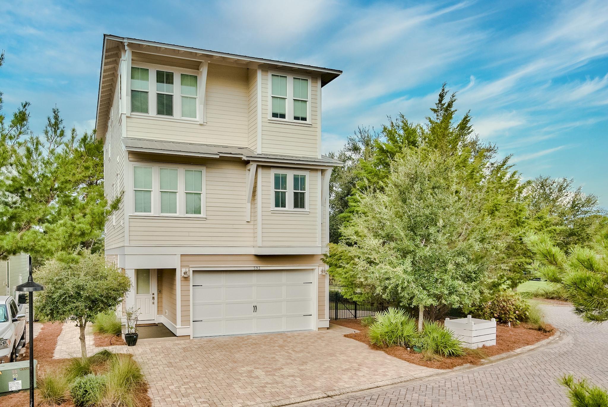 This Beautiful Pristine Beach House w/3 Custom Finished Levels & an Elevator was THE MODEL HOME at Highland Parks. Immaculate and MOVE-IN READY! Home has never been rented and has all the bells and whistles. Open Floor Plan with Grand Living Area, Stunning Millwork, 4 bdrms, 3.5 baths, 2-car garage, and a Huge Recreation Room that can be used for 4th Bedroom, Bunk Room or Guest Suite, plumbed for 2nd kitchen. Gourmet Kitchen w/Island, Custom Tile Backsplash, Granite Countertops, Gas Cooktop, Microwave/Convection Oven, Refrigerator. Laundry Room off the Kitchen w/Washer/Dryer & Shelving. Dining Area Seats 12. Large Level Corner Lot complete with expansive outdoor space, patios, porches, an orchard, and fenced sodded yard. Home is being sold unfurnished, but some furnishings are available to