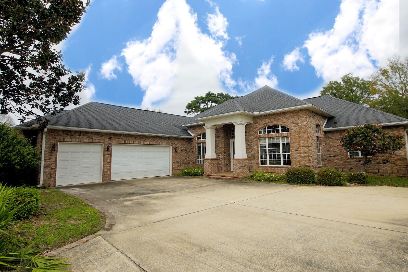 Custom built Home. In Bluewater Bay's Gated Magnolia Plantation. 4 Bedroom 3 bath with a screened in pool, 3 car garage. Well designed split open floor plan. With 14 ft. ceilings in Great room Dining room and kitchen areas, Custom Kitchen with granite counter tops and stainless appliances. a gas cook top with a custom hood. With an island for extra prep space. Eat-in area that looks out at the pool. Great room sliders fold all the way back for great pool side entertaining. Office or flex room off the Great room. One of the additional bedroom could be used as an in-law suite as it has its own bath room and enterance to pool. Built in desk, central vacuum. Many upgrades. Buyer to verify anything that is important to them