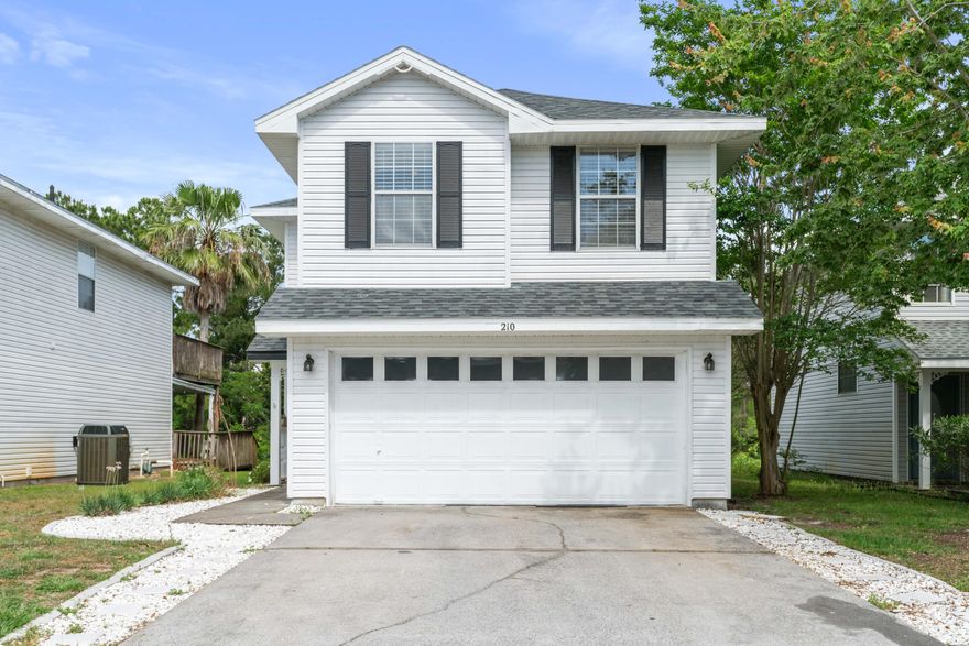 Check out this extremely well-kept waterfront home in the heart of Destin. This beautiful 3 bedroom 2.5 bathroom, 1650sqft home with a 2 car garage is nestled in the middle of Destin inside the sought after neighborhood of Twin Lakes.  Imagine waking up in the morning, drinking coffee on your balcony right off of your master suite with a this wonderful view of the lake. Home features two electric fireplaces, one in the living room and the other in the master bedroom. There is a porch on the main level behind the home that sits directly above the lake. So much love went into the design of this home by its current owners that the next family will not have to do any updating. Totally move-in ready! Call for your tour of this amazing home!