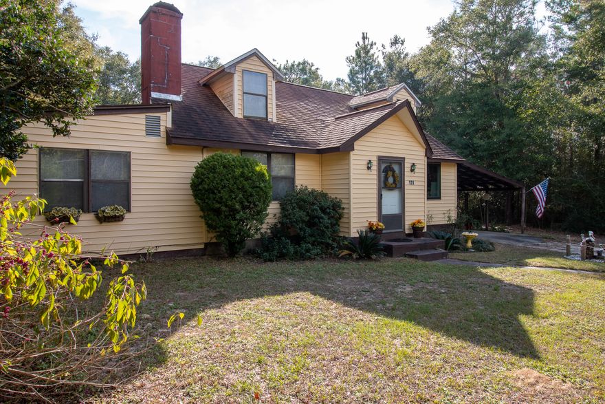 A large New England style home with 3 bedrooms and 2 full bath that embodies cute Defuniak charm! Nestled at the end of the street with a beautiful lake view. You can easily enjoy the access to the lake along with its fishing rights and picnic area. Spacious living, in a great location, great outdoor living and owner updates makes this a steal! With just a little love, you'll have a working fireplace to cozy up when the weather gets chilly! This home is located just off of highway 90, approx 8 miles to downtown Defuniak Springs, with easy access to I-10. With this purchase, you are getting both lots, so you'll have room to breathe and a space of beauty to call your own!