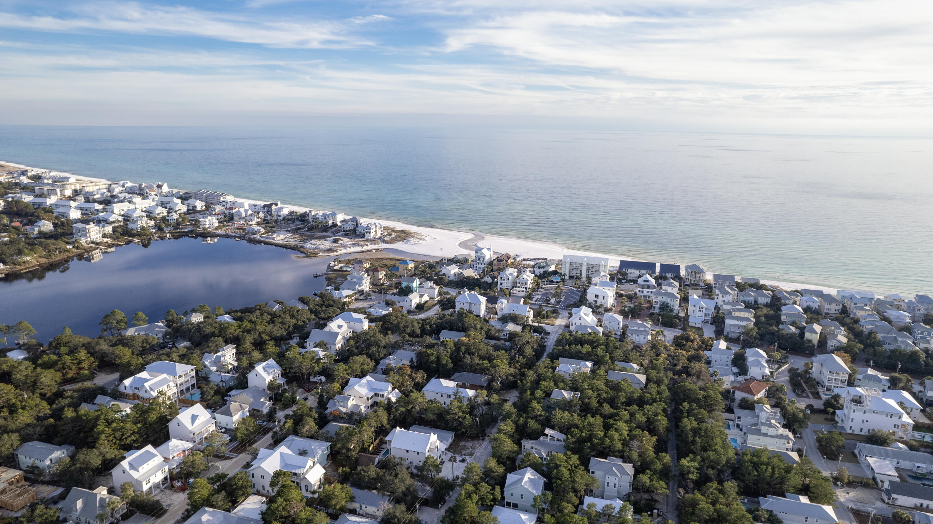 This lovely third floor unit at Commodore's Retreat is a beachside gem in paradise. Enjoy beautiful Gulf views from the large glass doors and windows in both the main living area and large master suite. The spacious balcony offers a place to take in the stunning views down the coastline and even the ever-changing Eastern Lake outfall. A dining area and the kitchen provide places to gather and entertain. The guest suite is in the north end of the unit with a full bath and laundry nook. Tile and wood plank flooring is found throughout the unit, and serene coastal colors and decor give this unit a fresh look. Enjoy the pool, spend your days on the plentiful beachfront, or drop your paddle board in the Eastern Lake. Commodore's Retreat is quietly tucked off of popular 30A and just minutes from desirable entertainment destinations including Seaside, Rosemary Beach, and Alys Beach. Paradise!