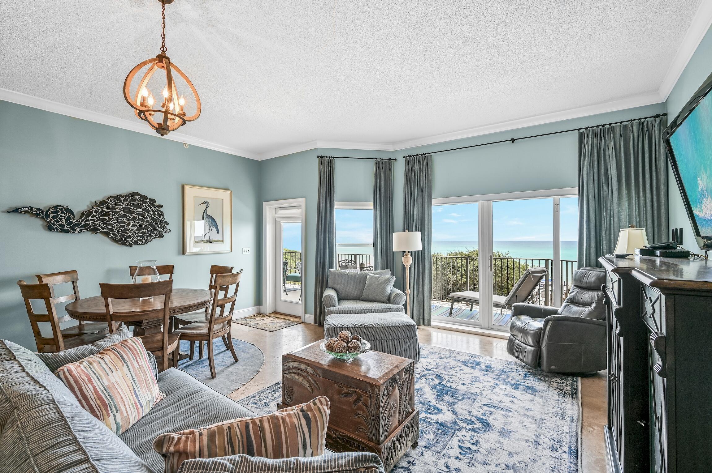 Located in the heart of Seagrove, this beautiful 2nd floor unit is located in the gated, Gulf front Legacy Condominiums. It features 4 bedrooms, 3 baths and almost 2,300 square feet of beach front living. The open floorplan with travertine tile throughout the living areas, vinyl plank flooring in the spacious bedrooms, 10' ceilings, crown molding, wet bar and a large kitchen that includes granite counter tops and stainless appliances blend the kitchen, living and dining areas together as a great space to enjoy family and friends. Unit will accommodate 12 guests. A large balcony extends the entire width of the unit with access from the living room and the master bedroom and is great for morning coffee or to enjoy the evening sunset. Hang out at the private beachside pool or enjoy
