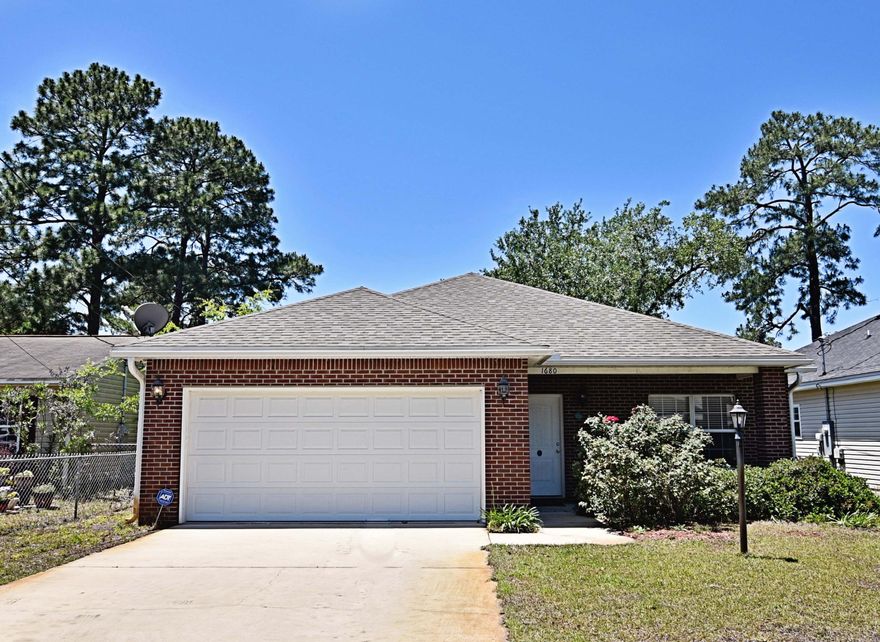 This 3br 2BR home, built in 2012 is in the heart of beautiful Niceville! The kitchen features granite countertops, stainless steel appliances, and ceramic tile floors. The spacious living room feels even larger with vaulted ceilings that really open up the room.The large Master Bedroom also has a vaulted ceiling, as well as a large walk-in closet and porcelain double vanity in the perfectly appointed master bathroom. Both bathrooms boast ceramic tile flooring. The carpet is in good condition in the decently sized additional bedrooms.The screened in porch is a perfect location for outdoor entertainment, looking out on the large fenced in backyard.