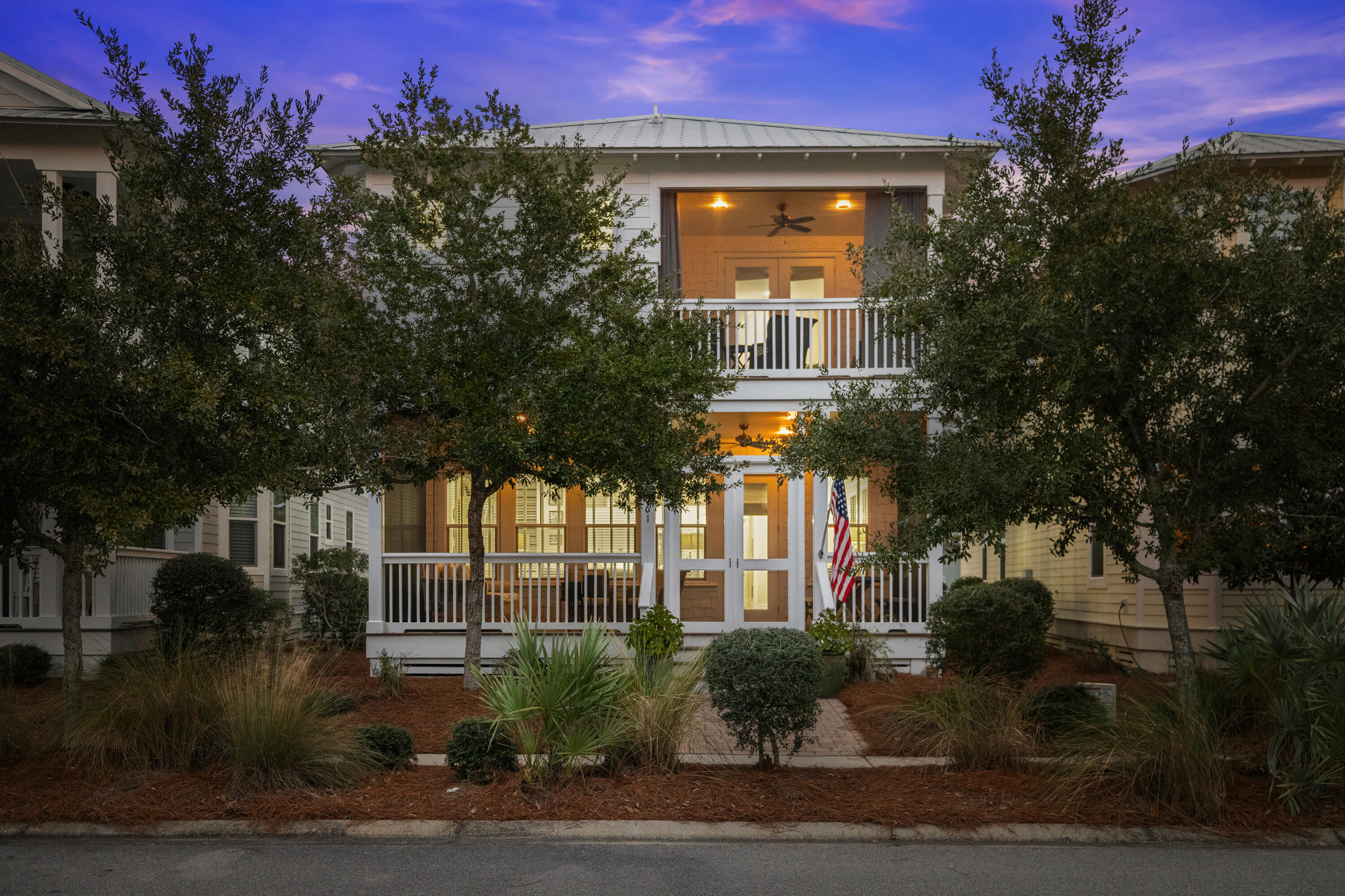 Welcome home to this idyllic beach cottage on 30A nestled against the natural beauty of NatureWalk at Seagrove. Built in 2015 and never rented, the home boasts hand chosen curated furnishings and fixtures throughout, accented by coastal artwork and custom accessories, lending the qualities of a true beach sanctuary. The home boasts three covered porches, outdoor shower, storage closet, and golf cart garage. You are welcomed by the screened front porch; a perfect spot to entertain with custom bed swing while enjoying the breeze and sea air. The first level features an open floor plan, highlighted by a true chef's kitchen including a five-burner gas stove, granite countertops, new stainless appliances, and subway tile backsplash. The dining nook is ideal for gathering accented by the breakfast bar with additional seating. Complementing the floor plan are two seating areas in the living room creating a flow for family and friends. Also found on the ground level is a spacious junior suite with double sinks, separate soaking tub and shower, three closets including an owner's lock out with extensive shelving. Finishing off the ground floor features are a powder room, and laundry room with a tankless Rinnai hot water heater.
 
The second level is just as stunning as the first, featuring the primary suite and two additional guest bedrooms. The large primary bedroom opens to a private balcony, and the en suite bath features separate vanities, a large soaking tub, and an oversized glass-enclosed shower. There are two additional guests rooms on the second level which are complemented by a jack-and-jill bathroom. There is an additional flex space serving as a second living area, media area, or sleeping space. There is also a golf cart garage and two additional parking space in the rear of the home with alley access. 


Upgrades include: Custom window treatments, new window screens, new refrigerator, microwave, dishwasher, and rear gutters.

NatureWalk at Seagrove is situated in a prime location, just minutes from shopping and dining at Watercolor Crossings and less than a mile from Seaside and Watercolor. 

The Gathering Place, NatureWalk's amenity center, features a resort-style pool, lap pool, and kiddie pool with an outdoor kitchen, fire pit, and jacuzzi. The community also includes a pickleball court, a kids' play area, swings, fitness stations, and miles of picturesque trails, including a direct path to the beach, which is just a five-minute bike ride away.