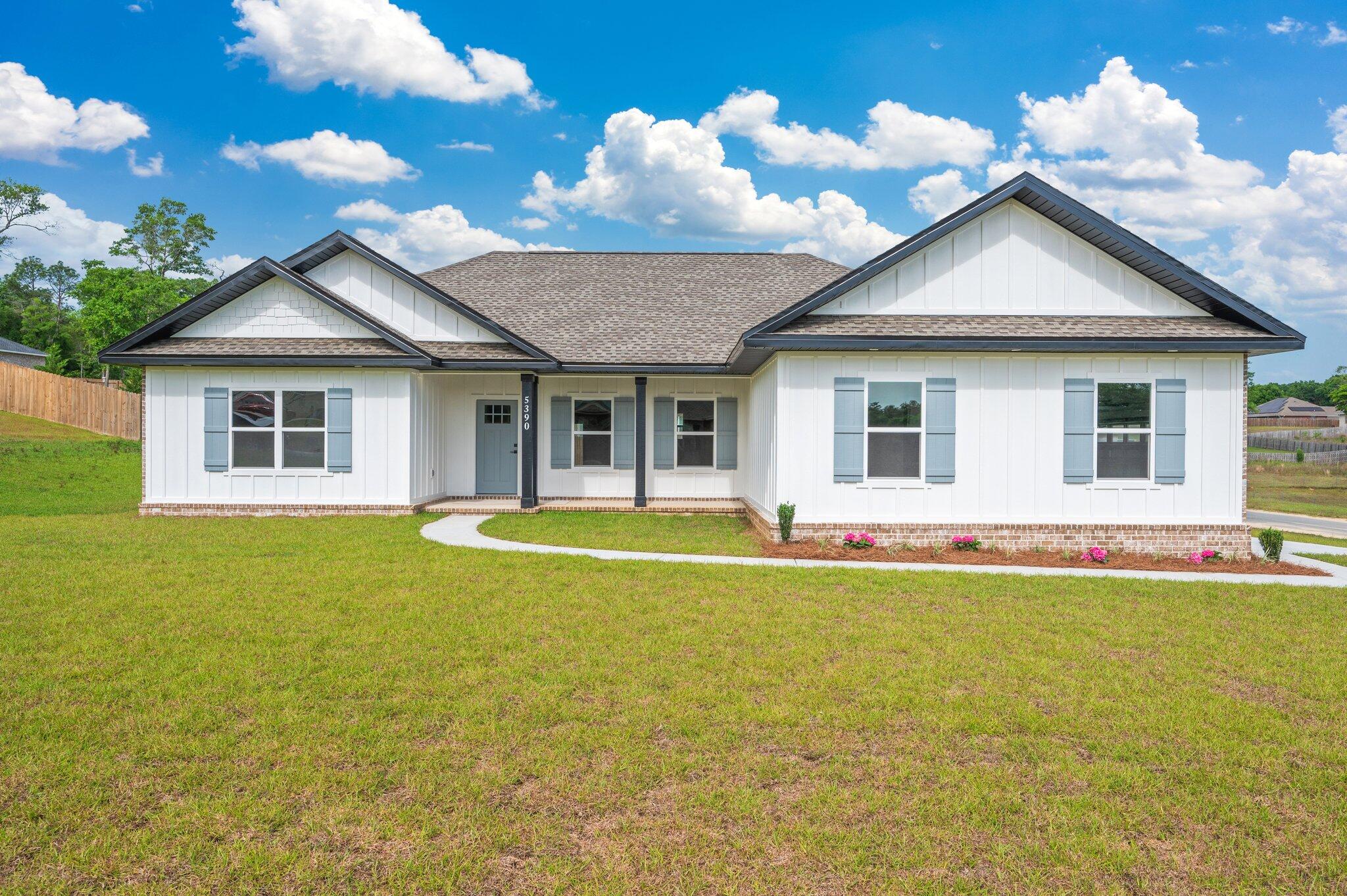 FREE 5-year home warranty included. Seller will pay $7500 in buyers closing costs. Ready now! Modern black and white new construction with brick exterior. All wood look tile throughout. White cabinetry and all granite countertops. Stainless steel appliance package. Master features room-length walk in shower, dual vanities and walk in closet. This is located on over a half acre corner lot.