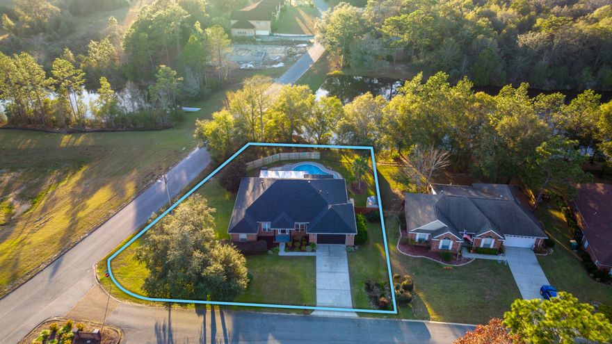 This 4/3 WATERFRONT home is located in South Crestview just minutes from 7th Group and a short drive to both Eglin AFB and the stunning Emerald Coast. As you enter into the home, you are greeted by an office to the left and the formal dining area to the right.The livingroom is open to the kitchen making it perfect for entertaining. The master bedroom offers a trey ceiling as well as outdoor access. The master bath has a seperate tub and shower with two walk-in closets. The additional bedrooms are generously sized with ample closet space. The kitchen features stainless steel appliances, corian countertops, and a tile back splash. The oversized laundry boasts additional cabinets for storage and a wooden countertop perfect for a folding area.