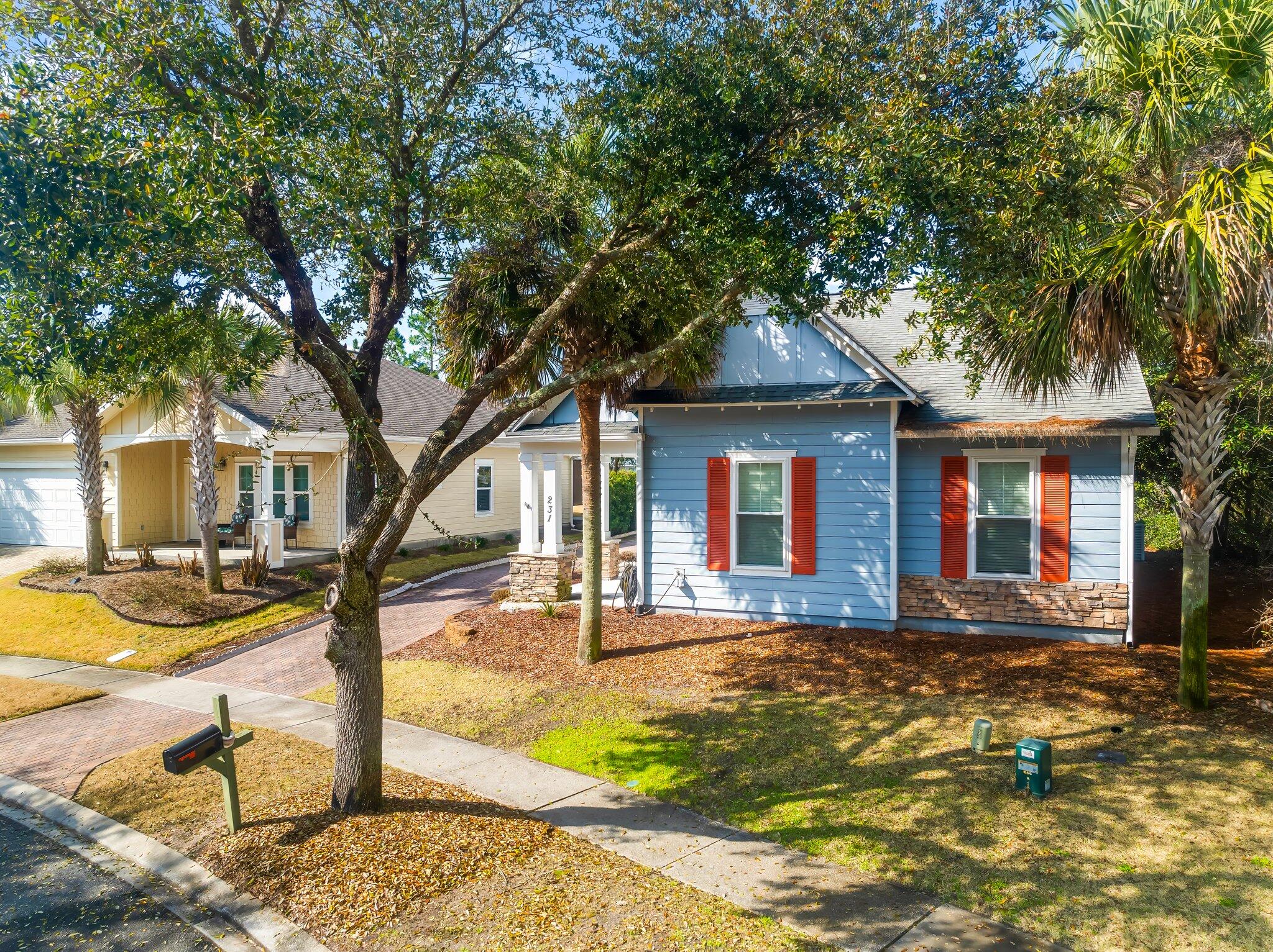 Get the best of both worlds: Tucked into a quiet residential community AND close to terrific amenities!This 3/2 is well designed with a split bedroom plan, front and back porch, and backyard with storage. High ceilings add to the spacious feel.The open design also includes dining space for 4-6 plus 3 at the kitchen island.Walk to basketball and tennis courts, the large community meeting room, pool, and hot tub, or enjoy the area's largest dune lake: Lake Powell.Don't miss this well-priced property! We look forward to scheduling your tour.