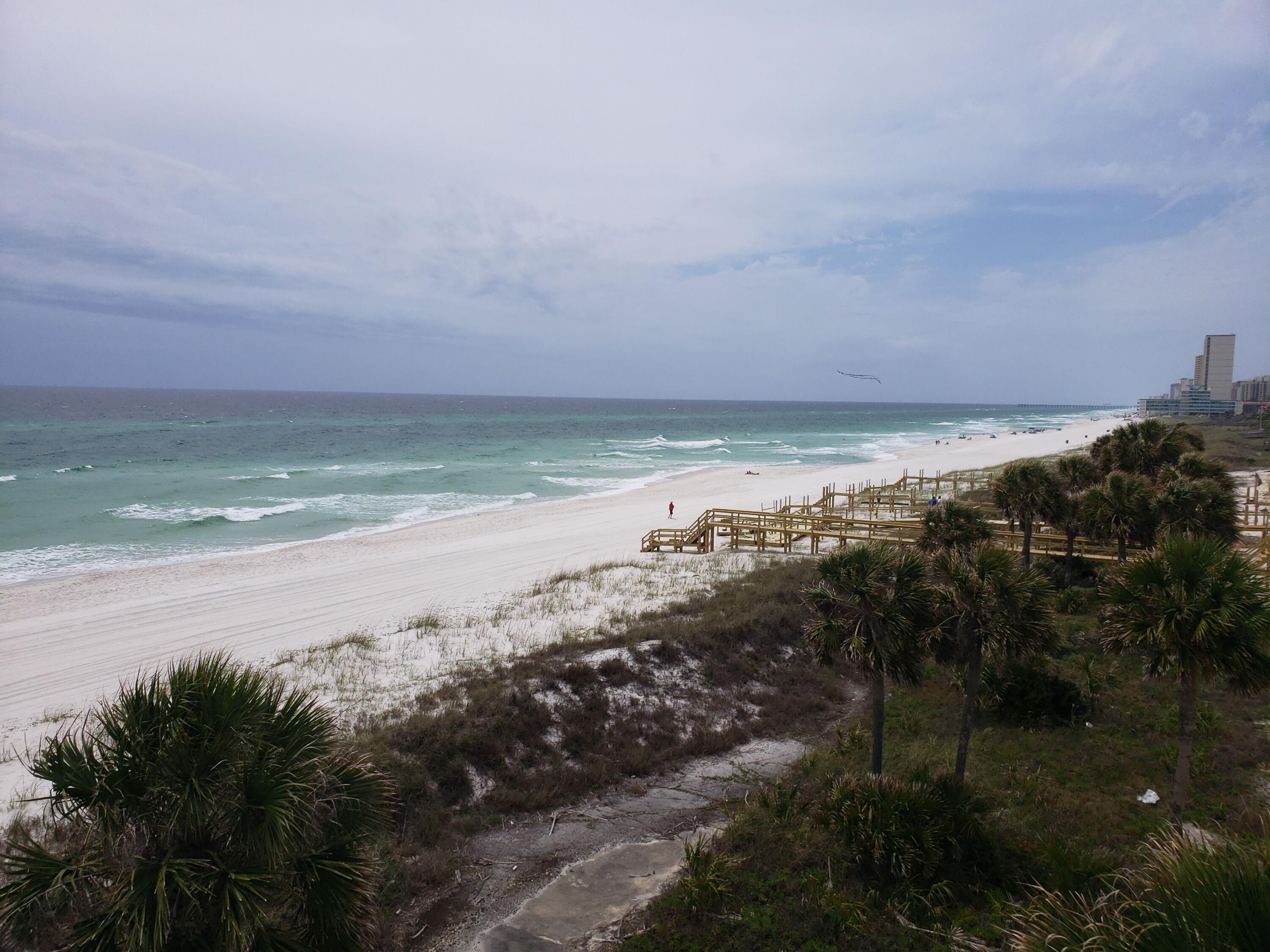 Spacious luxury with a Margaritaville lifestyle in our largest floor plan await you! This amazing beach front home features spectacular views from every level of this new construction, 6 bedroom plus bunks, 6 1/2 bath home. Margaritaville Beach Cottage Resort offers homeowners a chance to live the dream of owning at Margaritaville and the opportunity to share that dream with vacationers eager to book a stay here! You'll have a hard time deciding which way to enjoy the water first! You can relax in your private 8 x 17 pool overlooking the Gulf, enjoy the huge resort pool, take a trip around the 425 ft long lazy river or walk just a few steps down your private dune walkover to the emerald green waters of the Gulf.