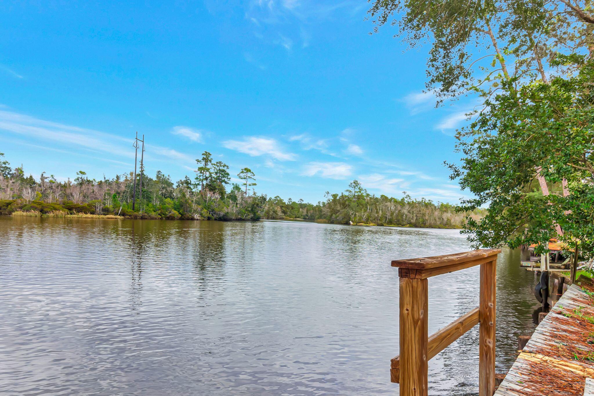 Welcome to this charming 2-bedroom, 2-bathroom house located in the beautiful city of Milton, FL. This cozy home boasts a spacious kitchen with a large island, perfect for entertaining guests or enjoying a quiet meal at home. The large back porch offers stunning views of the water, providing a serene and peaceful atmosphere. The property also features a garden tub, ideal for relaxing after a long day. With a generous lot size, there is plenty of space for outdoor activities and gardening. Don't miss out on the opportunity to make this lovely house your new home.Contact us today to schedule a viewing. Call 850-729-0399 View rental requirements or apply at www.RentwithBSR.comNo smoking or vaping. pets may be allowed with some restriction and a $400 non-refundable pet fee. FEES: $50 per adult 18+ application fee, Landlord Liability Policy (if proof of Renter's coverage is not provided) $15 mo, Pest Assurance pest control policy $20 mo.