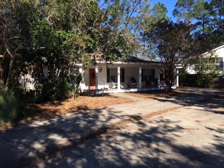 LOCATION! LOCATION! LOCATION!! Great opportunity to own your own home located close to the Beaches, Bay, shopping, restaurants, schools and hospital. Charming 3 bedroom, 2 bath home in a great neighborhood, situated on a large wooded Fenced Lot in the quiet community of Palmetto Plantation. A great permanent residence or ongoing rental opportunity. Palmetto Plantation has a community pool, picnic area, gazebo and playground. To the north, Cessna Landing Park is less than a mile and features public boat launch with Bay access and a nice spot for the kids to play and have lunch. To the south, Ed Walline Beach Access at Gulf Place is only about 2.5 miles where you can spend the day at the beach & shopping at Gulf Place.