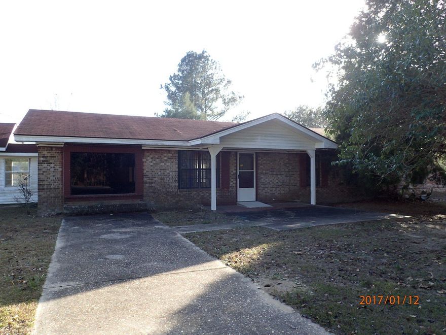 This 3084 square foot REO home is located just west of Paxton and just east of Laurel Hill. Resting on 1 acre, this 6 bedroom 2 1/2 bath home has tons of potential and priced to sell! the original footprint of this home has been modified several times of the years creating large square foot foot print. Home has place for office/study, oversized laundry and 2 master bedrooms. A detached covered bldg with potential for multiple outside restroom areas is already constructed. Home needs work and will only qualify for conventional or fha rehab loans. Call today to schedule your viewing!