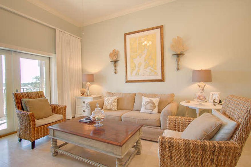 BEAUTIFULLY DECORATED TOP FLOOR CONDO at Seagrove Highlands. Travertine, hardwood floors, and a tile backsplash are just a few of the features that give this property the WOW factor! Our beautiful beach is just a short walk away! Seagrove Highlands boasts a large private pool, community room, and a pier overlooking serene Lake Mira. 3 bedrooms and two spacious baths, with 10 and 12 foot ceilings, with crown molding, make this unit live large. Walk or bike to many popular restaurants and shops, from this heart of Seagrove location!!