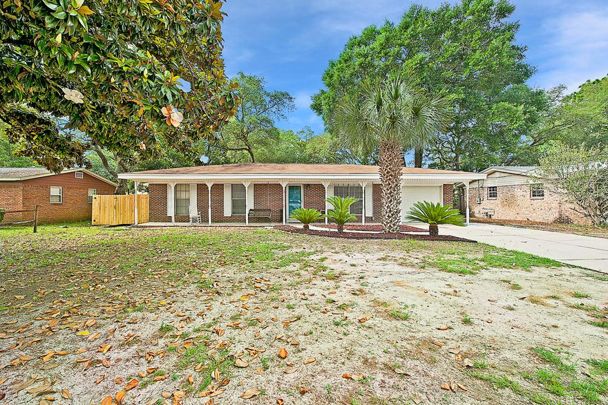 3 Bed, 2 Bath Fort Walton Beach HomeImagine the summer evenings you'll enjoy on your front portico that stretches the entire length of your all-brick home.Upon entering, to your right is a spacious living room. Continuing down the hall is the kitchen featuring 18-inch tile floors, LG stainless-steel appliances, abundant cabinet space, and an open floor plan into the dining room. Off of the dining room is access to the laundry and large garage. Down the hall is access to the homes three carpeted bedrooms. Back through the dining room is sliding-glass door access to the large, fenced-in backyard with a decked patio.This is a perfect starter home perfectly priced in the center of Fort Walton Beach. Call me now to find out more!