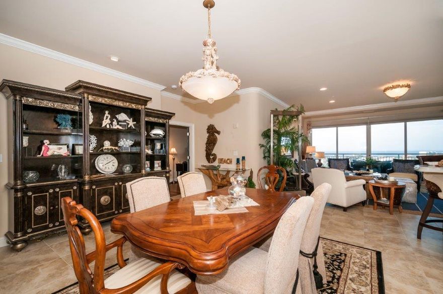 Incredible 7th floor 3BR/3BA Grand Harbor unit on the beautiful Destin Harbor. This lovely unit is adorned with a custom fireplace, floor to ceiling windows, intricate crown molding, recessed ceilings, luxurious travertine and wood flooring and much more. The kitchen is designed for elegance as well as functionality. Everything is easily accessible and it features a large pantry, an abundance of cabinet space, quartz countertops and top of the line stainless appliances. The sink, faucet and all appliances were replaced in 2015. Bedrooms are very large and each has its own bathroom. The master bedroom and one of the guest bedrooms feature new natural black walnut hardwood floors.