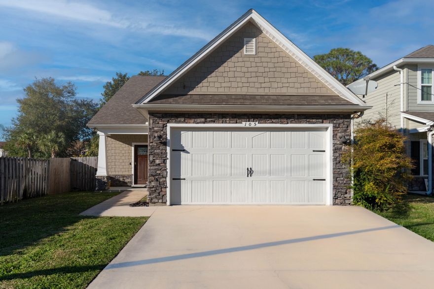 Seller offering $11,000 towards 2% interest buy down for the first year and 1% for the second year!!!7 minutes from Eglin main gate. 20 minutes from Hurlburtfield AFB.  3 minutes to bay front access facing Destin with small public boat slip.This pristine Craftsman-style home is fully smart-enabled and move-in ready--no HOA! The open floor plan includes a kitchen with stainless steel appliances, a gas stove, and a pantry. The spacious living room flows into a dining area with a breakfast bar. The primary suite offers private backyard access and a luxurious en-suite bath. The fenced backyard boasts mature trees, a covered patio, and an irrigation system. This home offers comfort and convenience. Schedule your tour toda