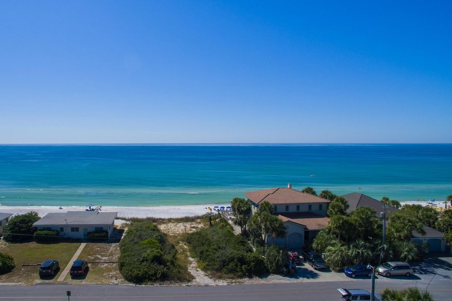 Situated high on a bluff in the heart of Blue Mountain Beach, this lot enjoys an elevation of 26' above sea level. With over 75' of Gulf frontage, this sizable lot will accommodate a home with tremendous views of the Gulf of Mexico. With deeded ownership stretching to the mean high water line, this property presents an extraordinary opportunity to own a piece of paradise.