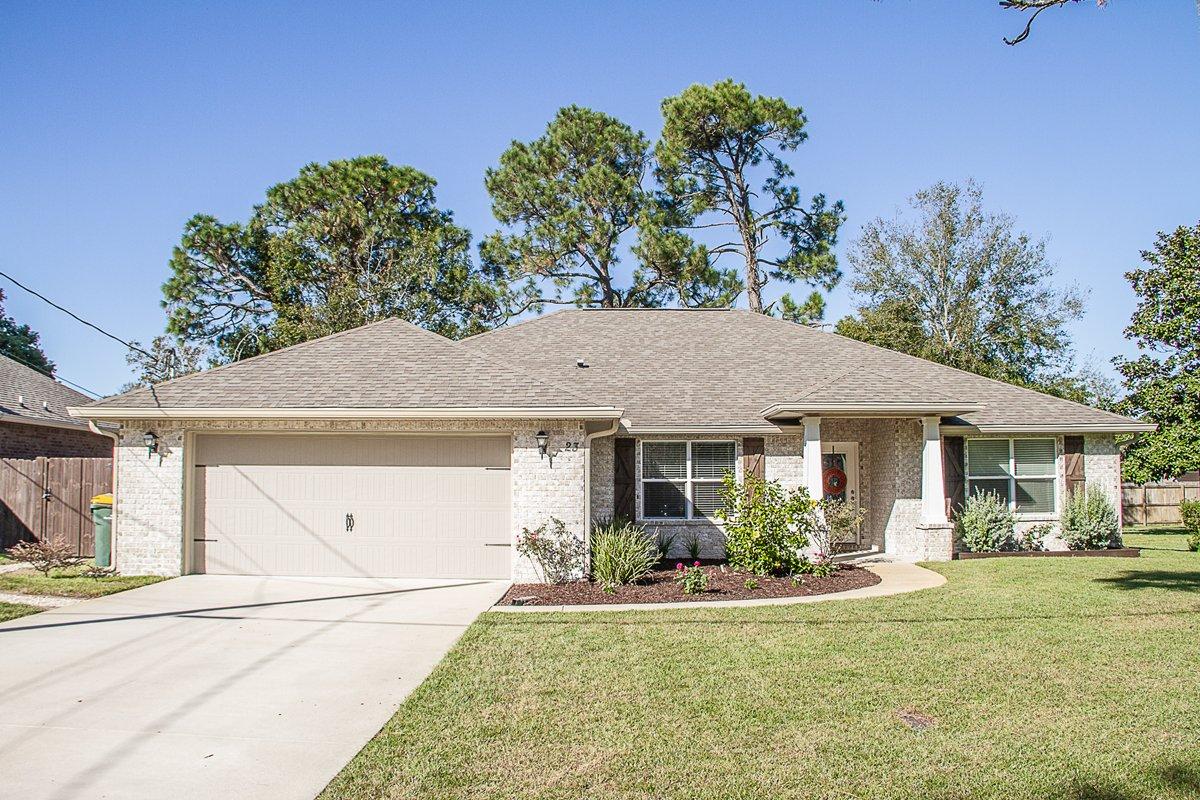 PHENOMENAL LOCATION IN FT WALTON BEACH LESS THAN 6 MILES FROM EGLIN & HURLBURT AFB, 1 MILE TO THE BEACHES, AND EXCELLENT SCHOOL SYSTEM!! Built in 2017, the house is furnished with driftwood plank tile floors, highlighting its elegance throughout the living room, kitchen, hall, hall bathroom, and laundry room. All interior doors are two panel and all of the windows are high efficiency with blinds for your privacy. The kitchen in your home has granite counter tops providing you with plenty of counter space for cooking, birch wood cabinets have soft close drawers, and Whirlpool stainless appliances with refrigerator. Your master bathroom has the same granite counters tops as the kitchen with dual sinks and large custom tiled shower with seamless glass door, walk-in closet, and ....