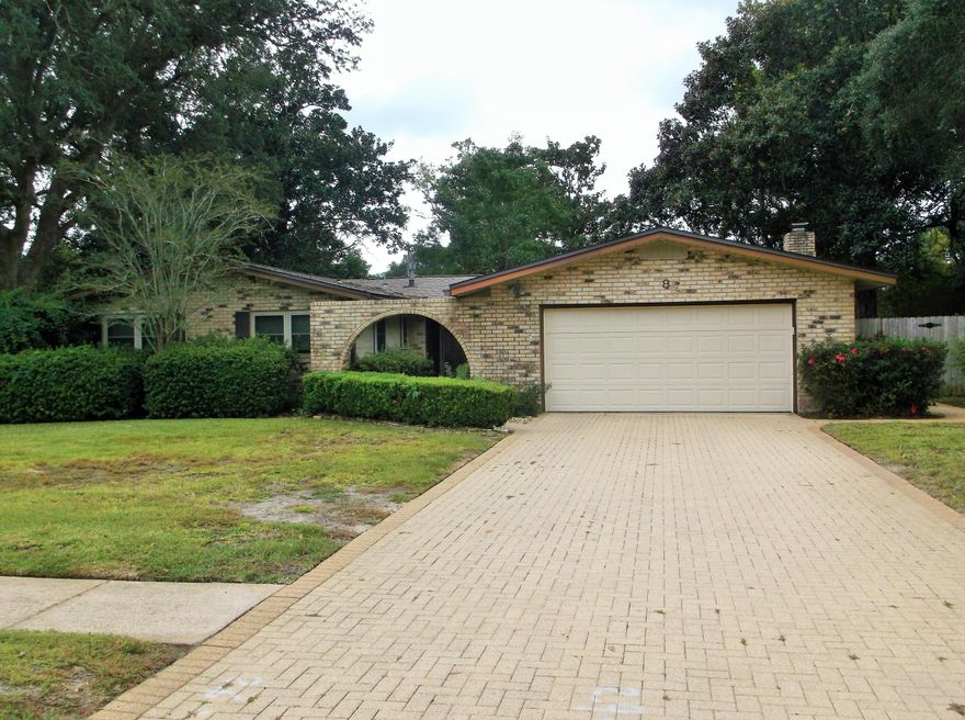 Full of charm & potential, this spacious, brick, 4-bed, 2 bath, one-story pool home sits on a lovely cul-de-sac lot, surrounded by old growth trees.  It is in the Kenwood /Pryor/Chocktaw school zones, while only 10 minutes from Eglin AFB & 15 minutes from Okaloosa Island.  Improvements include a new roof 2021; pool liner 2019; HVAC 2016 & replacement windows 2014, plus stainless-steel appliances. You'll enjoy a formal living room that is perfect for entertaining, with a gas fireplace & built-in bookshelf's that are ideal for showcasing your favorite treasures.  This room also has sliding glass doors that connect the living space to the deck, creating a seamless flow for outdoor entertaining.  The primary bedroom has sliding glass doors that open directly to the 14'X40' inground pool- -perfect for a refreshing morning swim or a midnight dip.  The brick paver driveway has matching walkways leading to both the front door and the backyard, which has a wood deck with built-in benches and corner table (built in 2022).  This charming home is ready to welcome its next owner and their personal touch!
