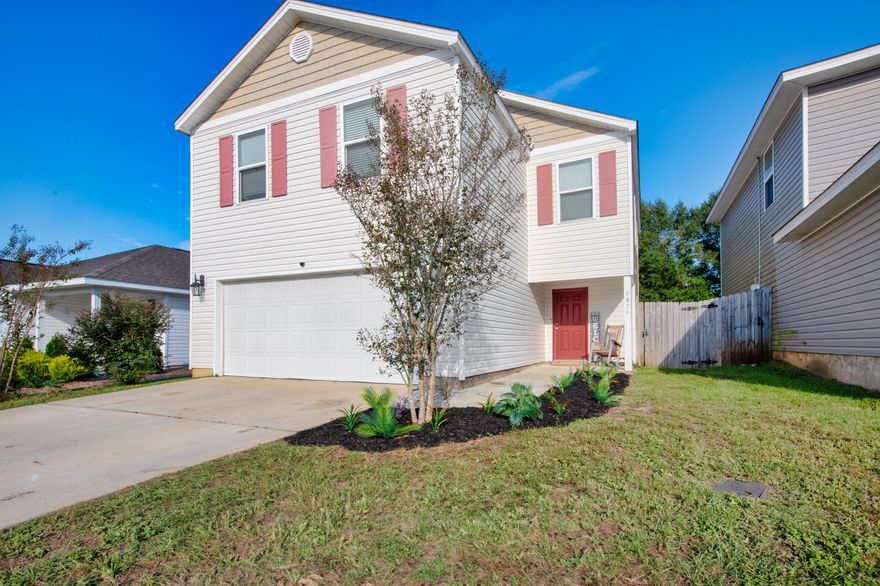 $5k anyway money with acceptable offer! Never miss a moment downstairs from the kitchen, dining area, or living room with this beautifully maintained true open concept floor plan. The kitchen is outfitted with open shelving, farmhouse sink, and chef's faucet. The privacy fenced back yard is accessed through french doors, perfect for letting in that Autumn breeze. Bedrooms are located upstairs with the master bedroom to your right. The en suite bathroom features a separate shower, garden tub for soaking your cares away, double vanity, and large walk in closet. The laundry room is conveniently located upstairs as well and includes a Samsung washer and dryer. Nestled within walking distance of the Publix shopping plaza and under a 15 minute drive to historic downtown Milton and Whiting Field