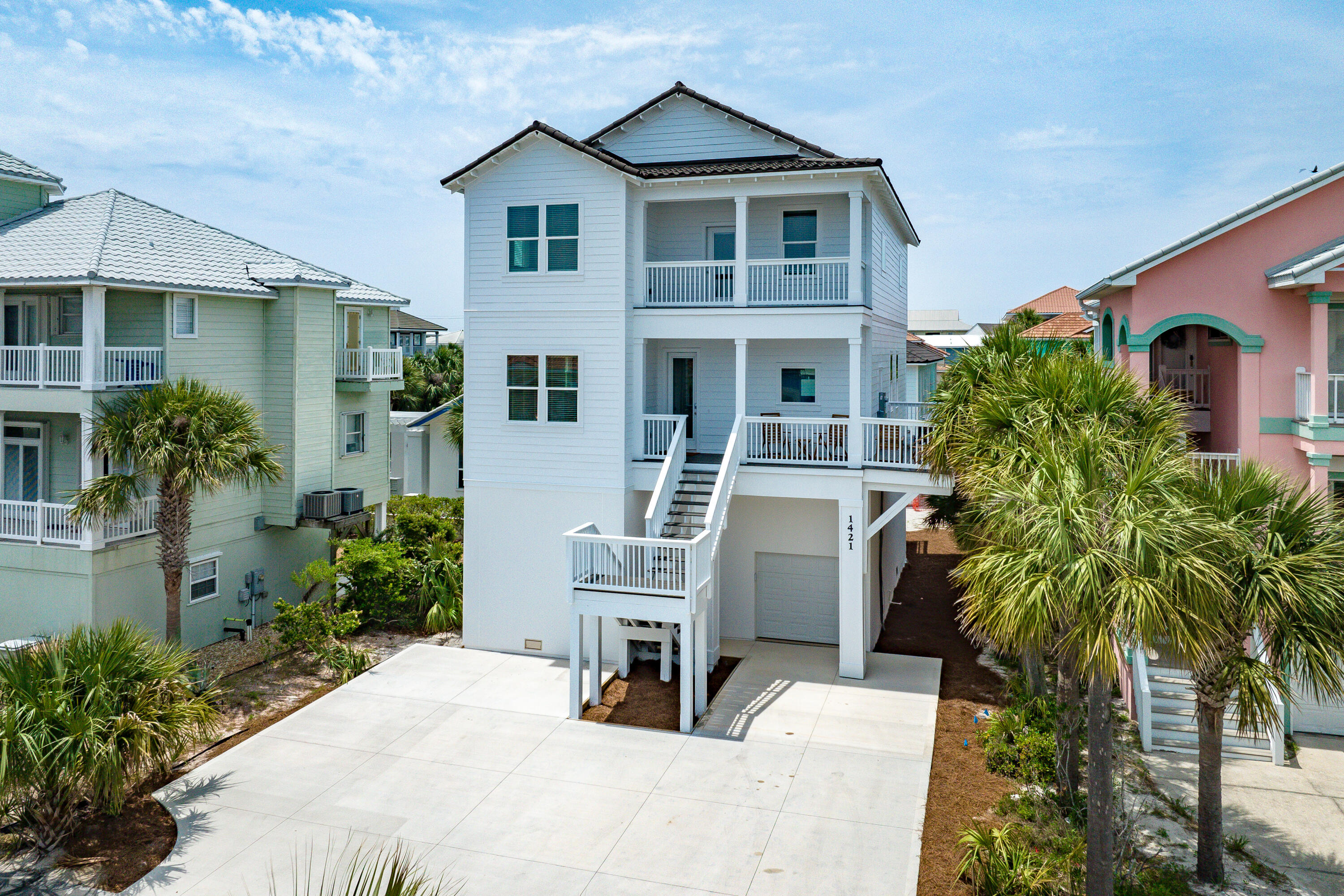 Listed under appraised value! This gorgeous new construction home is located in the highly sought-after Village at Navarre subdivision. Boasting Gulf and Navarre Sound water views, nestled across the street from beach access and with dock access to the Navarre Sound. what else could you ask for in a beach home? This 6-bedroom, 6.5-bath home is what beach home dreams are made of!