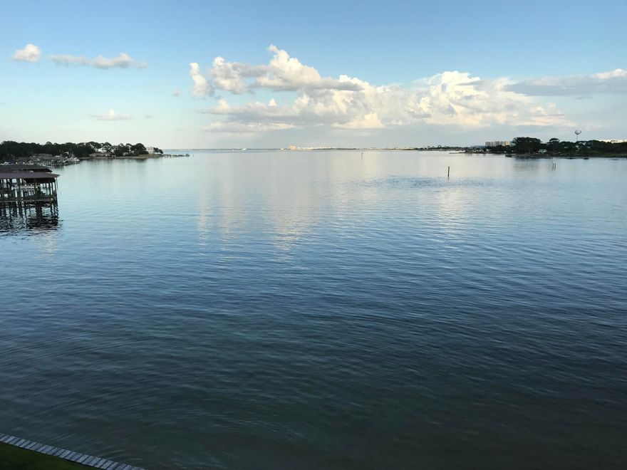 This is a gorgeous completely renovated 3BR/2 1/2 BA third floor unit. It is especially unique because of its close proximity to the pool & dock. Freshly painted, brand new flooring, granite counter tops, & stainless appliances. Villa Di Mare is a luxury, bayfront development and is highly sought after. Its elegant, Italian-designed brick/stucco buildings have a premier setting on the Choctawhatchee Bay. All buildings have 2 staircases & an elevator. Large balcony enhanced by white railings & large pillars has expansive views of the bay. This unit comes with a 16 x 40 deep water boat slip off the private dock that leads to the Bay & Gulf of Mexico.Centrally located near shopping, restaurants, beaches, Fort Walton Beach Landing & downtown Destin.