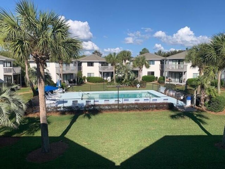 This condo is move-in ready with newly updated floors, paint, ceilings, light fixtures, and windows.  HWH, dishwasher, refrigerator, and electric range all replaced in 2023.  The unique octagonal floor plan creates a spacious and open atmosphere. Situated on the second story, this unit offers a delightful view of one of the two pools and the tropical landscaping. Additionally, one of the pools is heated for year round enjoyment.  Crystal Village is conveniently located just two blocks from the beach, making it an ideal place to call home!