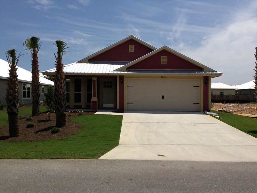 Adorable Florida Cottage! Great location in South Walton. . Just 2 blocks to Bay and short walk to Marigny Restaurant! 1668 sq feet, 3/2 Eagle Bay model home. Hard to find-large yard with partial fencing! . . .Hardie board exterior with metal roof, two car garage, irrigation system and patio. Interior of home has granite,bull nose corners, 51/4 baseboards, Moen fixtures, 2'' blinds throughout and GE Stainless Refrigerator and more! Fabric shield window and door hurricane protection as well. One year builder warranty and 10 year Bonded Builder Warranty. Low association fees of $285 per year. Community pool access available for a nominal fee. Builder pays closing cost(except prepaids)