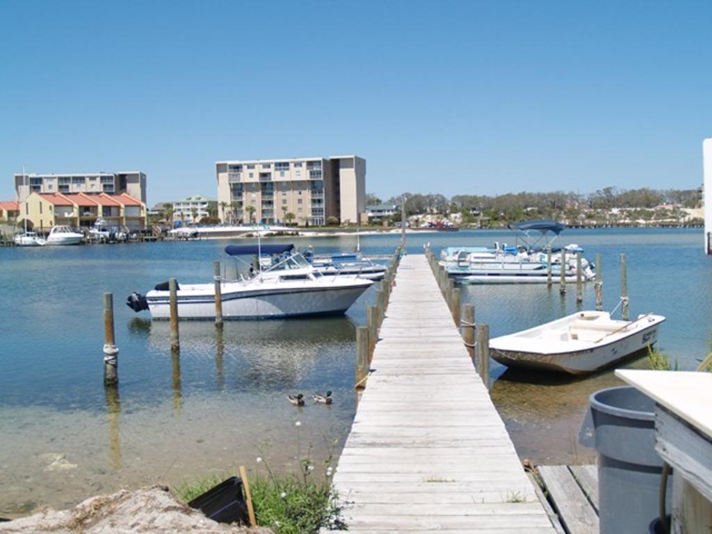 Great Location! First floor unit, 2 bedrooms, 2 baths. Tile floorss throughout. New Granite counter tops in Kitchen and Master Bath. Master bedroom is large with 2 closets. 2nd bedroom has a large walkin closet. Destin Sands is a small complex with association owned boat slips on the harbor and is across the street from the beach. A great place to live or play. Tenant is on a month to month rental.