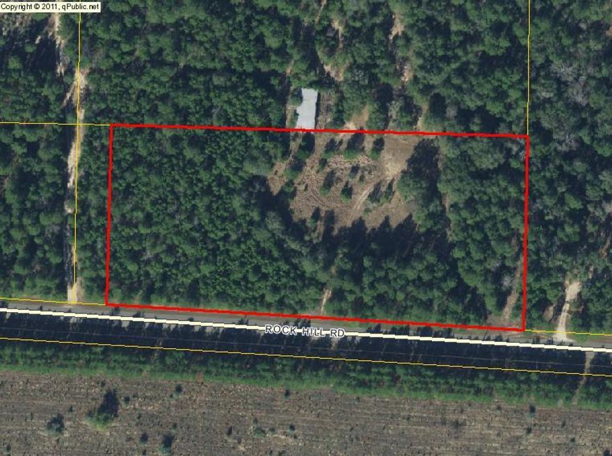 Perfect 4.15 acre site for a home or a weekend getaway! The middle of this level property is cleared with a few trees, and would make a great home site. The woods around perimeter ensure plenty of peace and quiet. Two access points make it perfect for a circular driveway onto Rock Hill Road which has very little traffic, yet is convenient to the major roads leading to the beaches, work, etc. Recent survey has boundaries clearly marked.