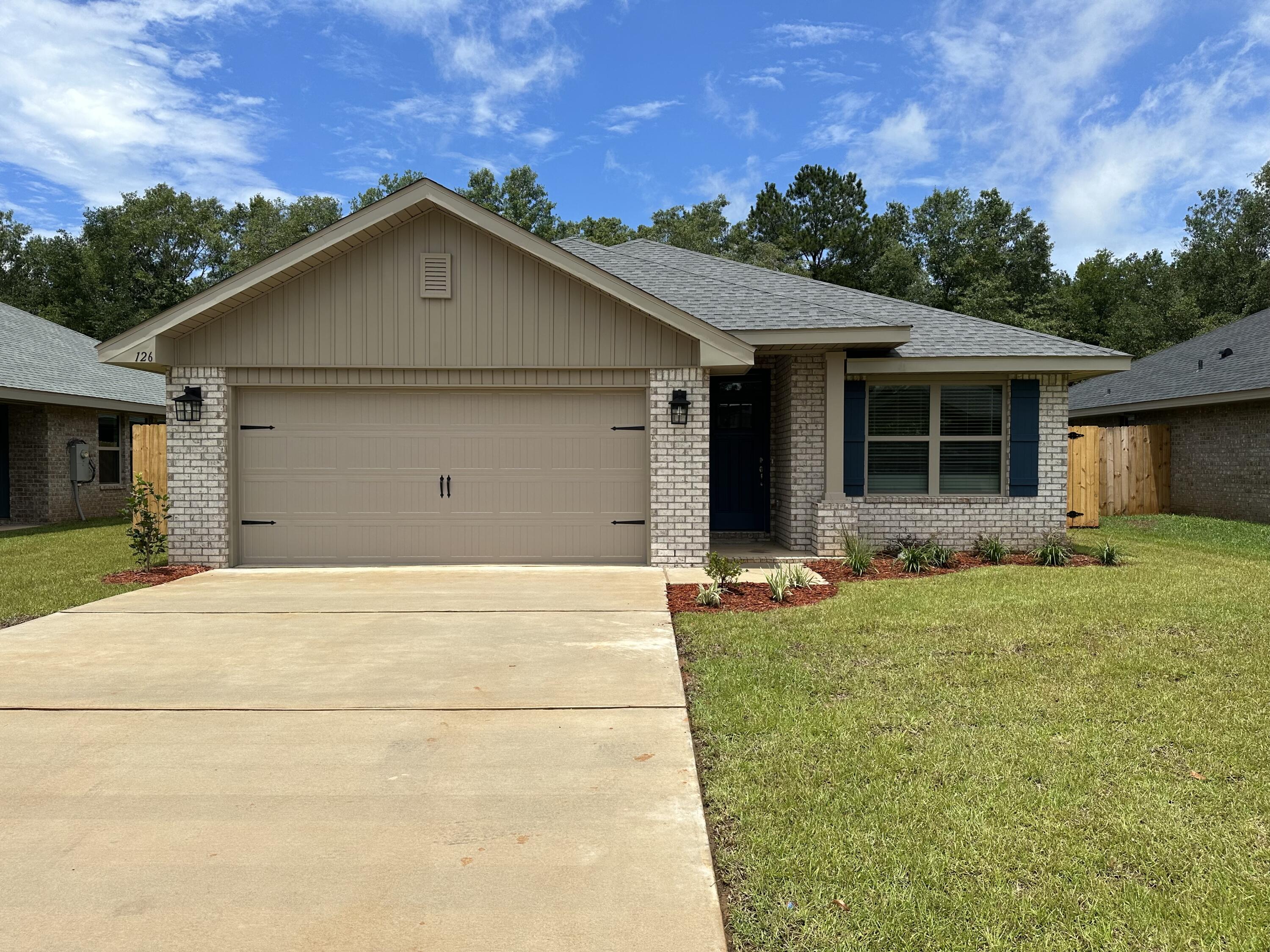Beautiful 4-sided brick Craftsman style home featuring 3 bedrooms and 2 baths. The open floor plan includes a spacious kitchen with an island, stainless steel appliances, and granite countertops throughout. The owner's suite offers a double vanity, walk in closet, and direct access to the covered back porch, which is also accessible from the family room. Additional highlights include an irrigated lot, washer and dryer hook up, and a community pool. The subdivision features sidewalks and street lighting for added convenience. Located in an area served by A rated schools, with ample dining and shopping nearby, this home combines comfort, style, and a prime location.