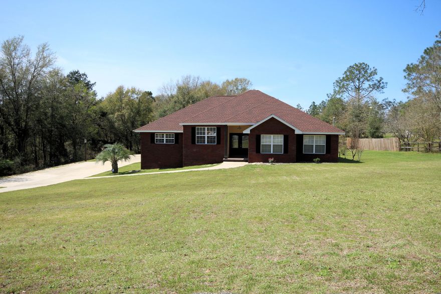 Enjoy peaceful, country living in this all brick, custom built home. New roof (October 2018) oversized in-ground pool with new liner (October 2018) new quartz countertops (October 2018), 4-car garage and large lot, just over an acre. Pretty lead glass entry doors welcome you into the large living room overlooking the pool and pastures. Home amenities include gas fireplace, hardwood flooring, newer carpet in bedrooms, tile in baths. Master suite has large, walk-in Jack and Jill closets. Home is conveniently located to schools, shopping and employment.