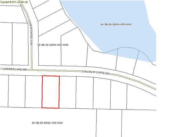 Lake Juniper Rd is a lovely area with all the quiet that the country can provide. This lot is close to two lakes. Enjoy fishing, canoeing, and country living. This property is being sold AS IS. All information is approximate and should be verified.